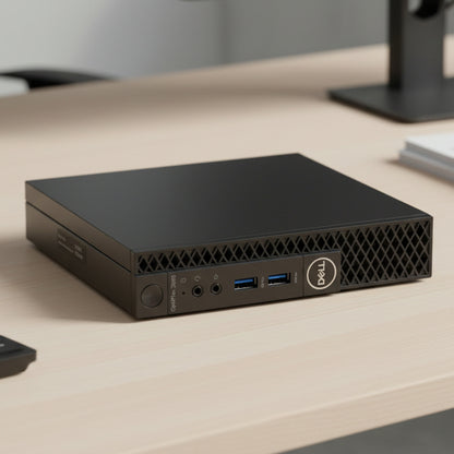 Refurbished Dell micro form-factor desktop computer on a desk in an office. 